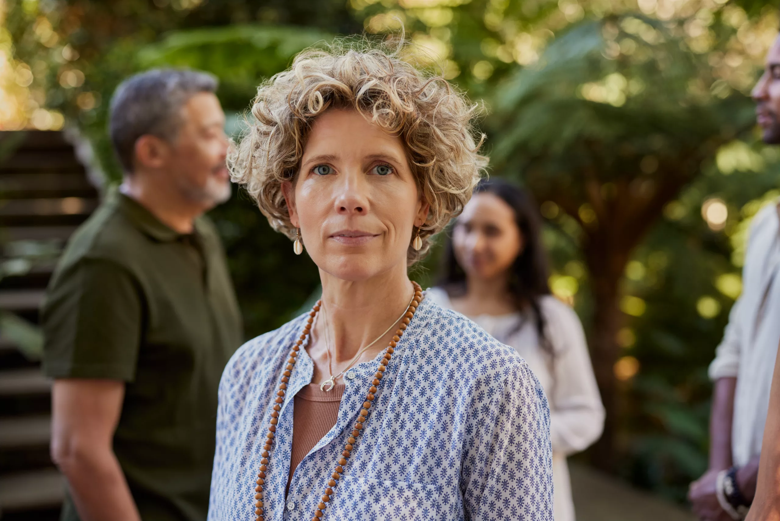 mature serene woman at wellness retreat outdoor 2025 06 29 20 33 22 utc scaled